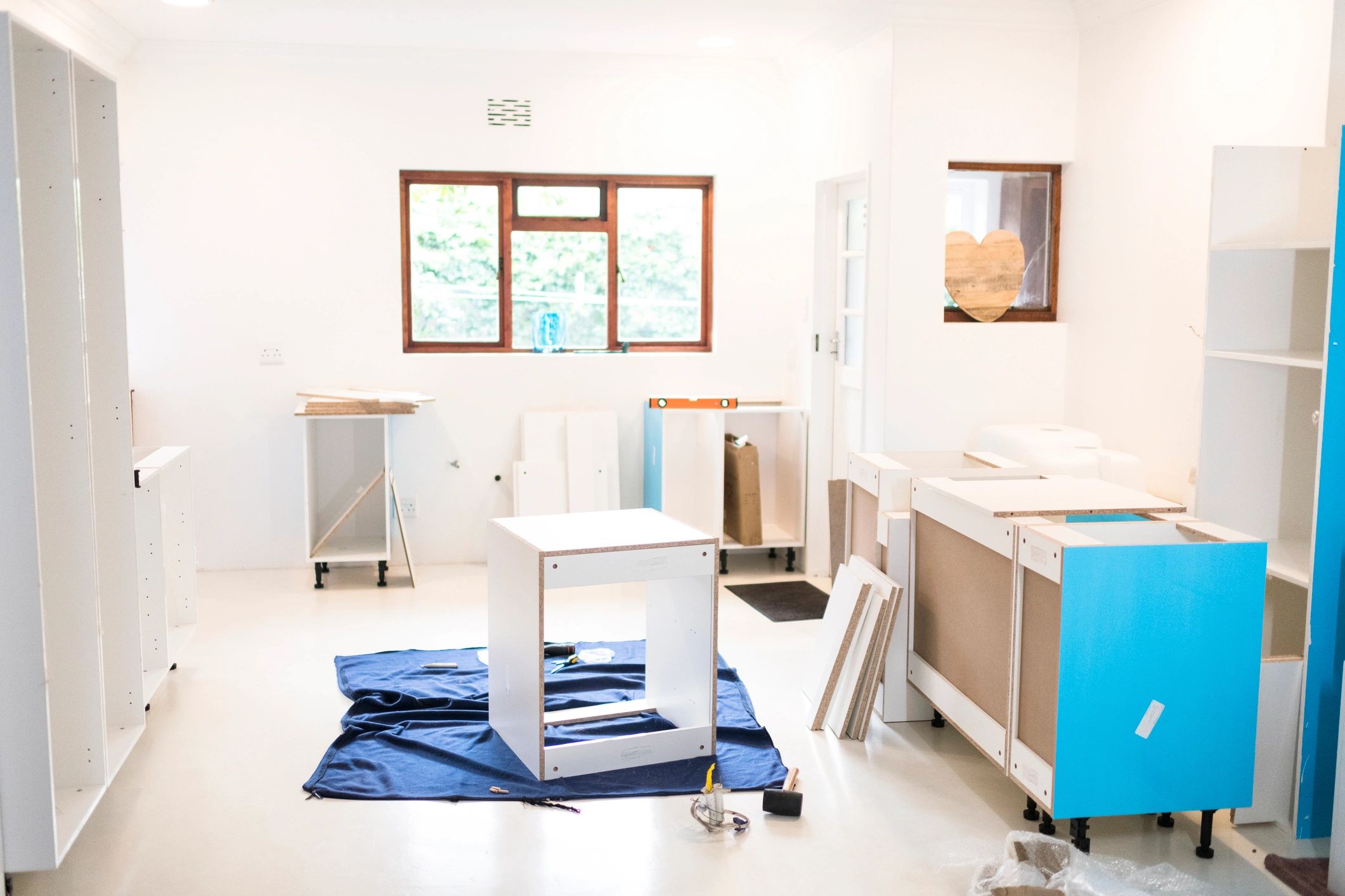 Kitchen units being assembled during installation