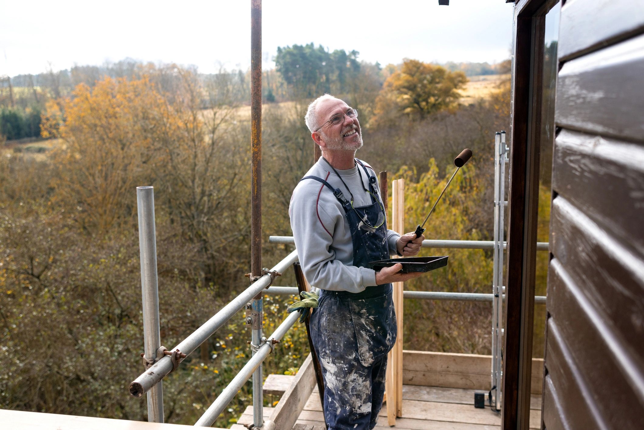 Property maintenance professional working on an exterior improvement project